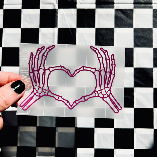 Skeleton heart hands