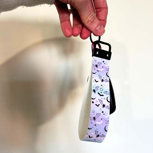 Pastle blue and pink wristlet with bat and moon design